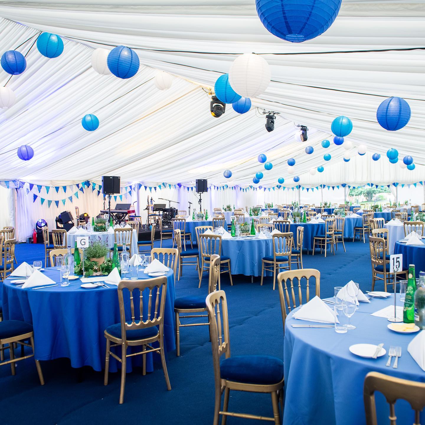 A marquee with pleated linings and blue accents